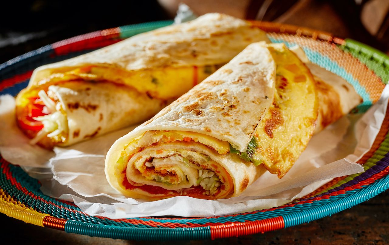Read more about the article The Ugandan Rolex: A Street Food Icon with a Side of Culture